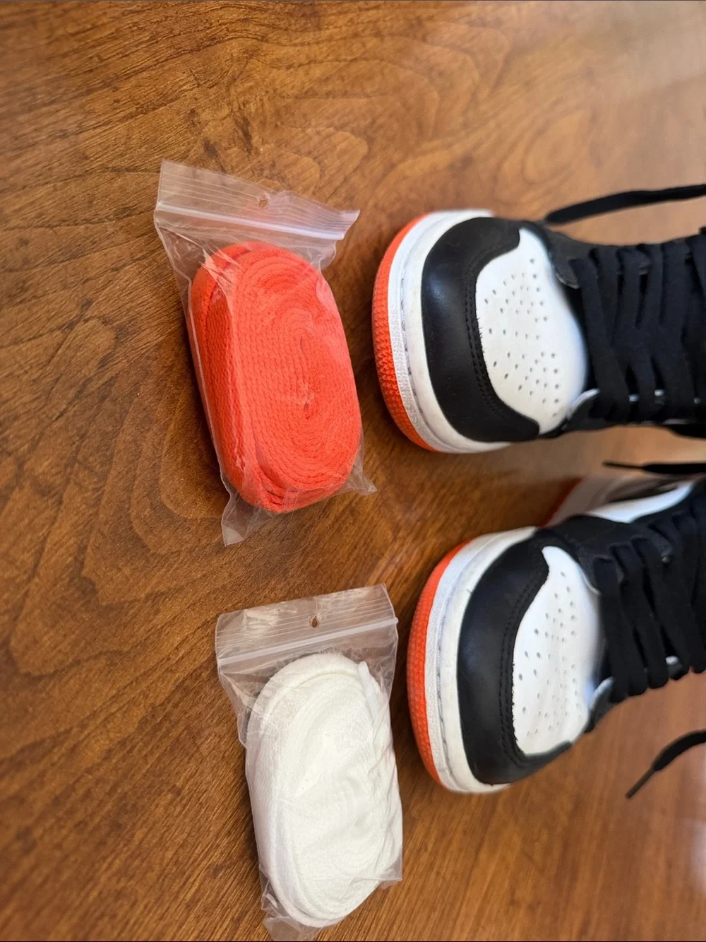 Nike High-Top Sneakers in Black, White & Orange Accents